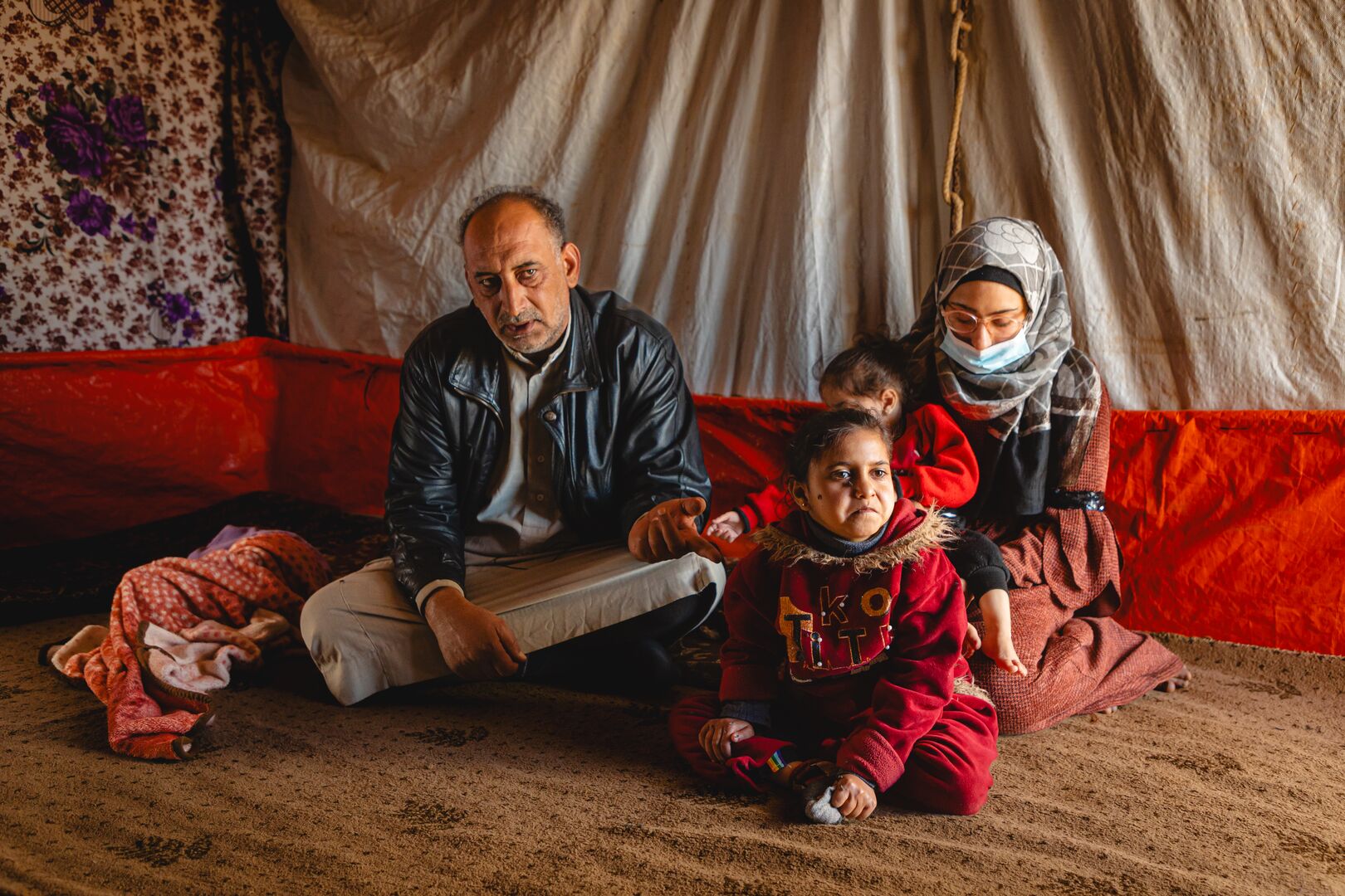 Jordan_Khaled-sitting-with-his-children