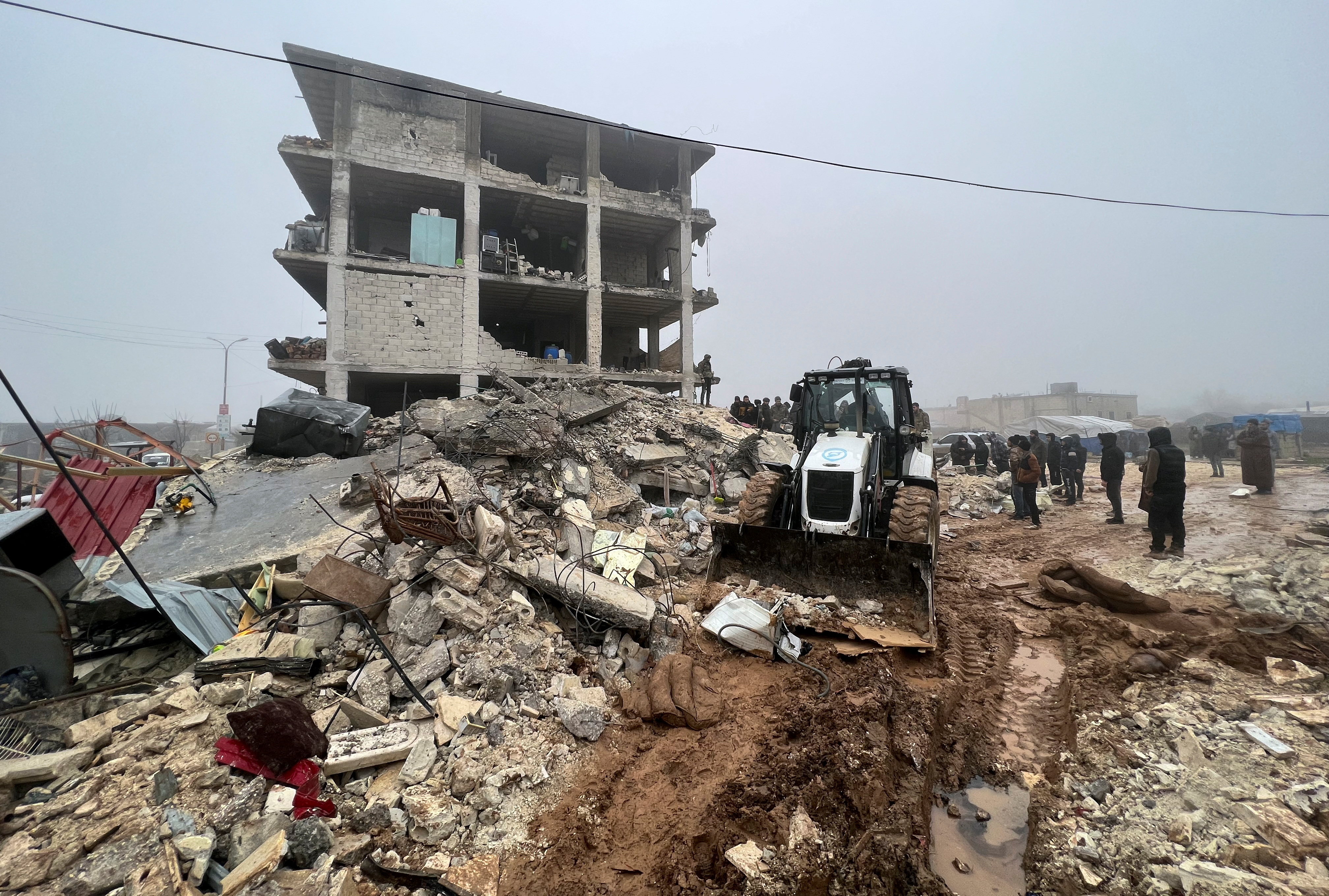 Syria_Earthquake_rescuers search for survivors under the rubble